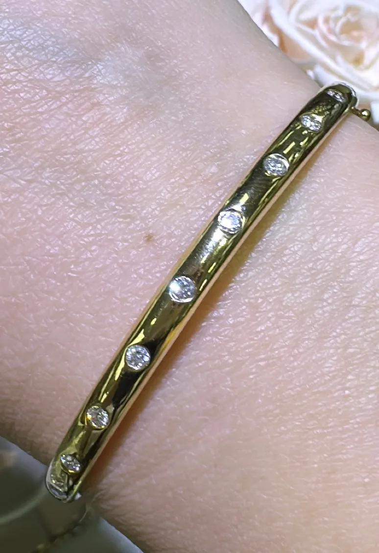 0.44ct tw Burnish Set Diamond Station Bangle Bracelet